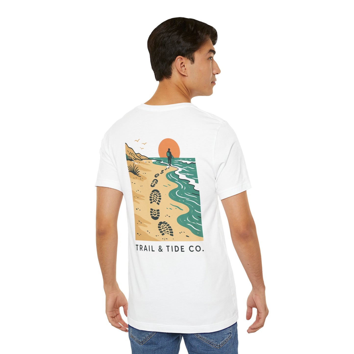 Tidewalker Tee | Coastal Trail Footprints Along Sunset Shore - Beach Walk Graphic Back Tee with Front Crest Patch (BC3001)