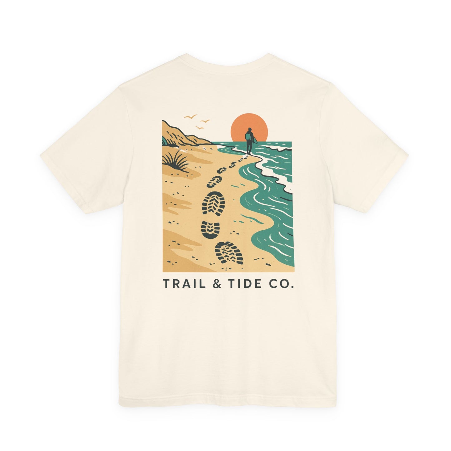 Tidewalker Tee | Coastal Trail Footprints Along Sunset Shore - Beach Walk Graphic Back Tee with Front Crest Patch (BC3001)