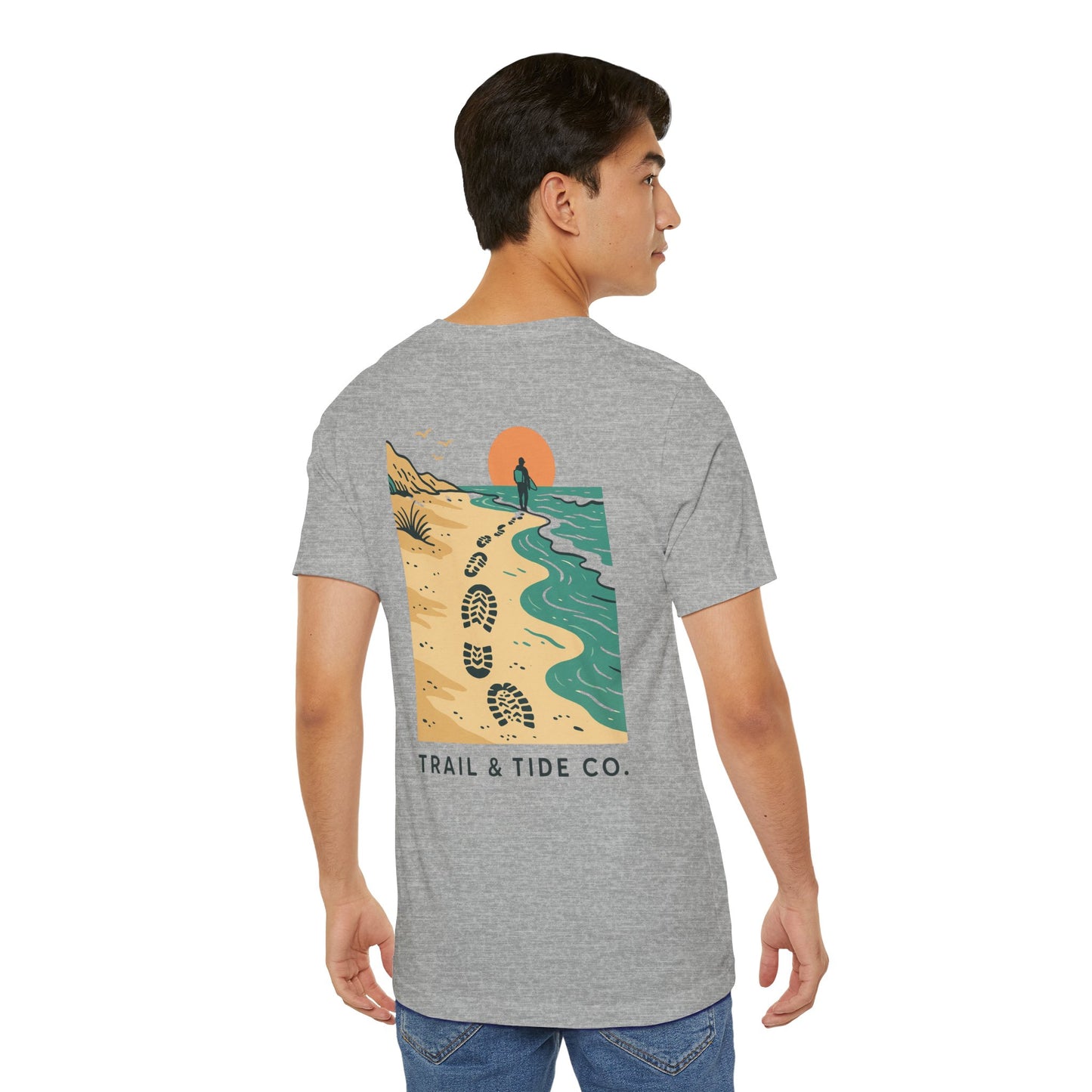 Tidewalker Tee | Coastal Trail Footprints Along Sunset Shore - Beach Walk Graphic Back Tee with Front Crest Patch (BC3001)