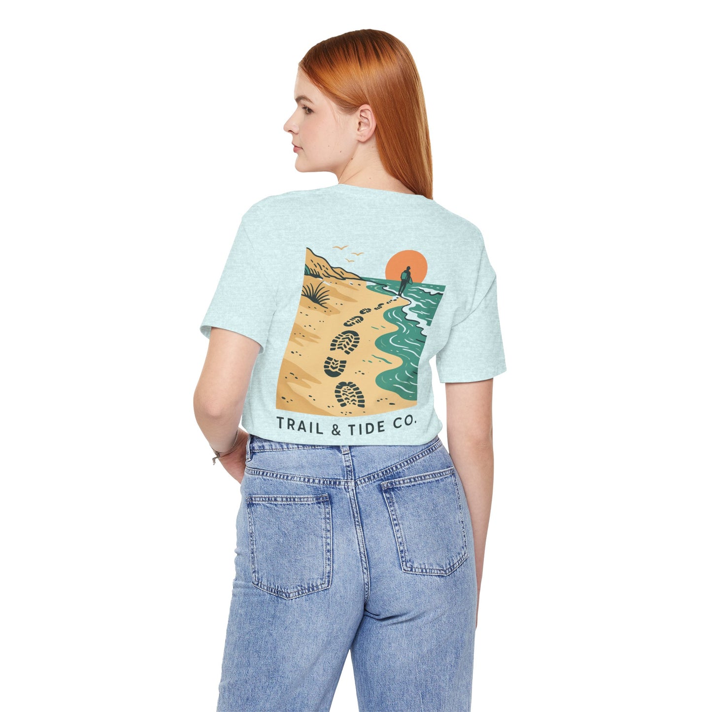 Tidewalker Tee | Coastal Trail Footprints Along Sunset Shore - Beach Walk Graphic Back Tee with Front Crest Patch (BC3001)