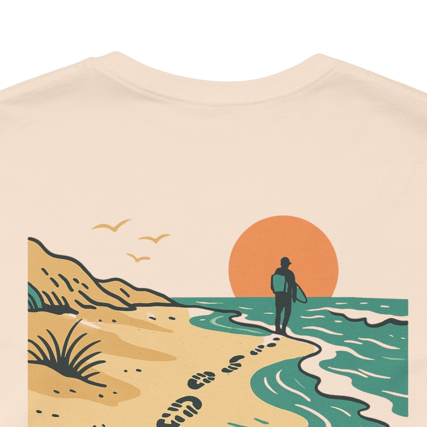 Tidewalker Tee | Coastal Trail Footprints Along Sunset Shore - Beach Walk Graphic Back Tee with Front Crest Patch (BC3001)