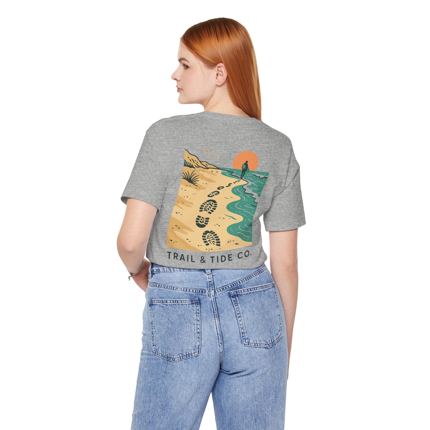 Tidewalker Tee | Coastal Trail Footprints Along Sunset Shore - Beach Walk Graphic Back Tee with Front Crest Patch (BC3001)