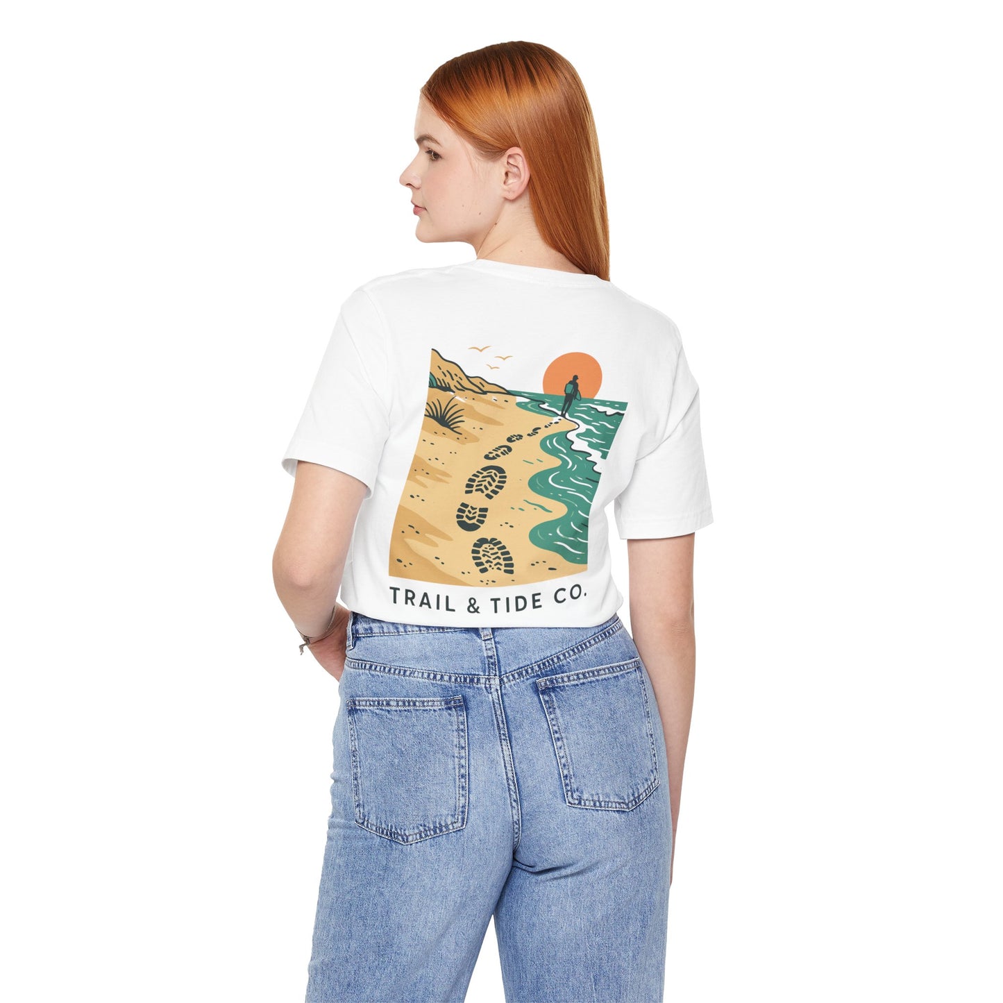 Tidewalker Tee | Coastal Trail Footprints Along Sunset Shore - Beach Walk Graphic Back Tee with Front Crest Patch (BC3001)
