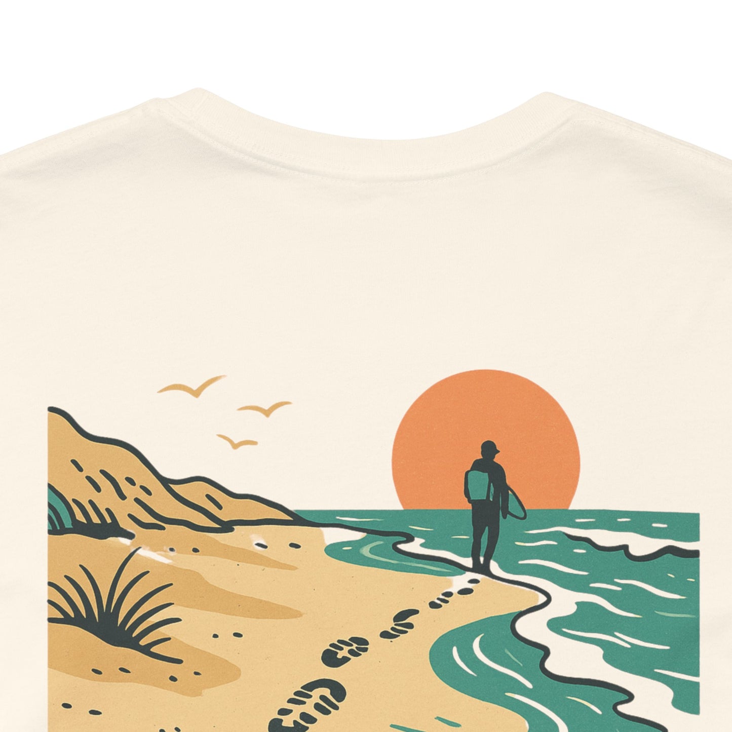 Tidewalker Tee | Coastal Trail Footprints Along Sunset Shore - Beach Walk Graphic Back Tee with Front Crest Patch (BC3001)