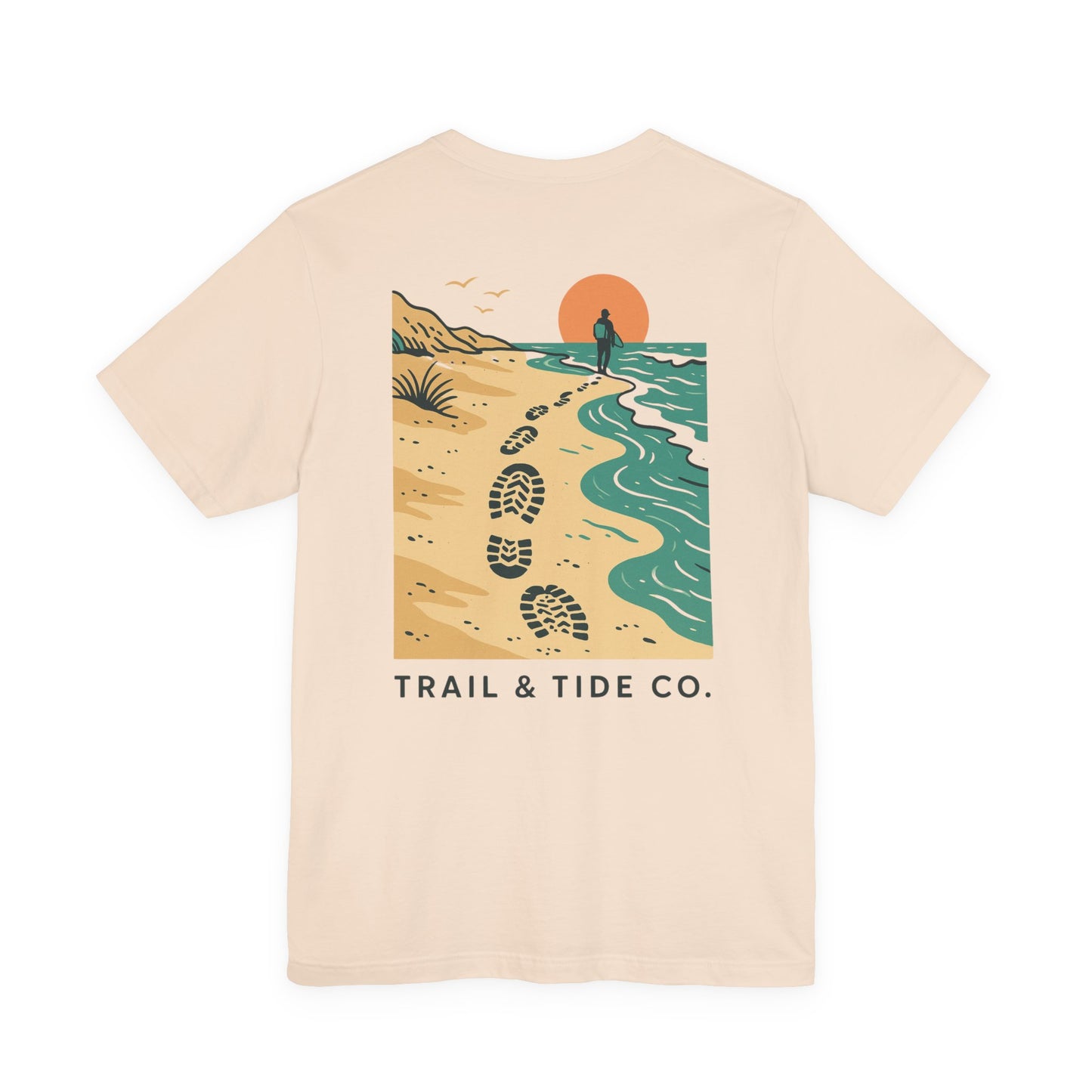 Tidewalker Tee | Coastal Trail Footprints Along Sunset Shore - Beach Walk Graphic Back Tee with Front Crest Patch (BC3001)